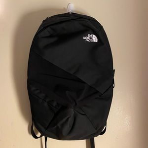 Black north face women’s Isabella laptop backpack. One size